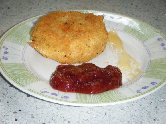 Aperitivo de queso templado empanado con mermelada o miel
